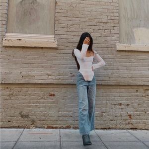 Khaite Maddy Notched Ribbed-Knit Top